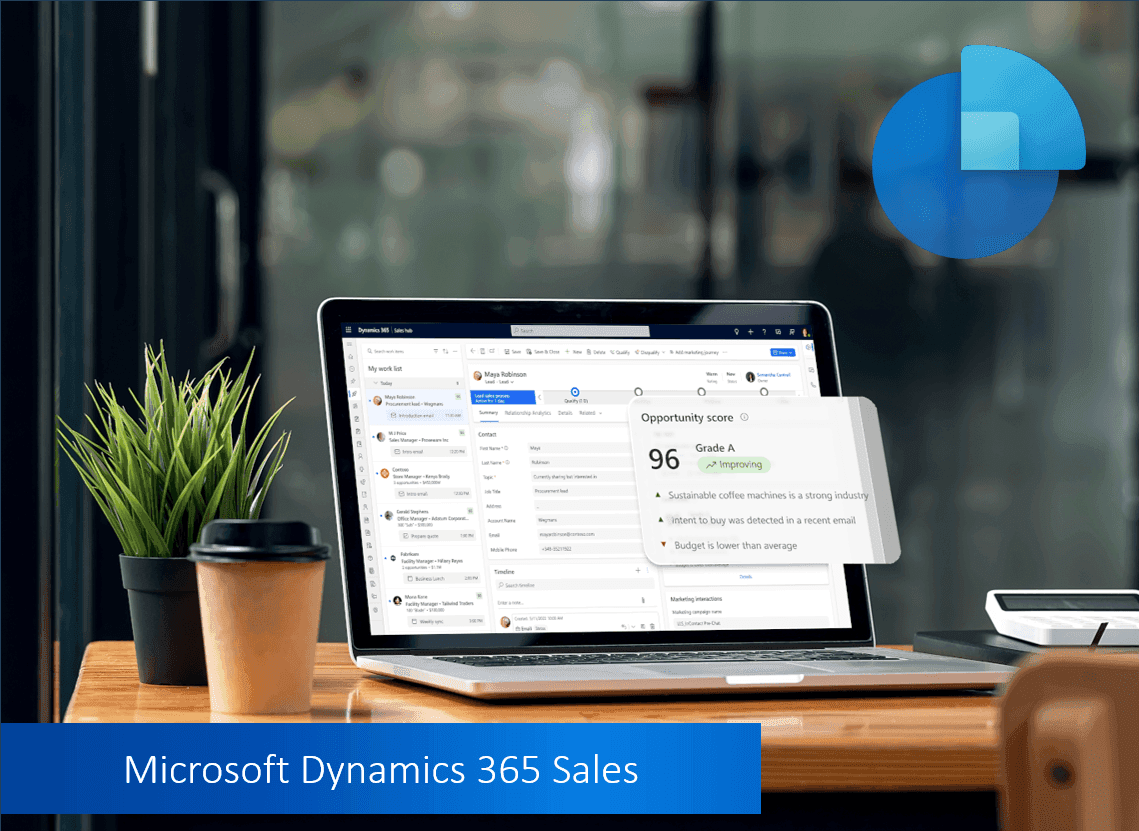 Laptop displaying Microsoft Dynamics 365 Sales software with coffee and plant, Dynamics 365 logo.