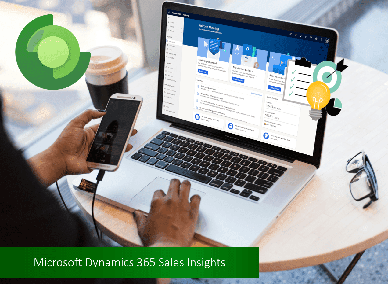 Person uses laptop with Dynamics 365 Sales Insights interface, holding a smartphone.