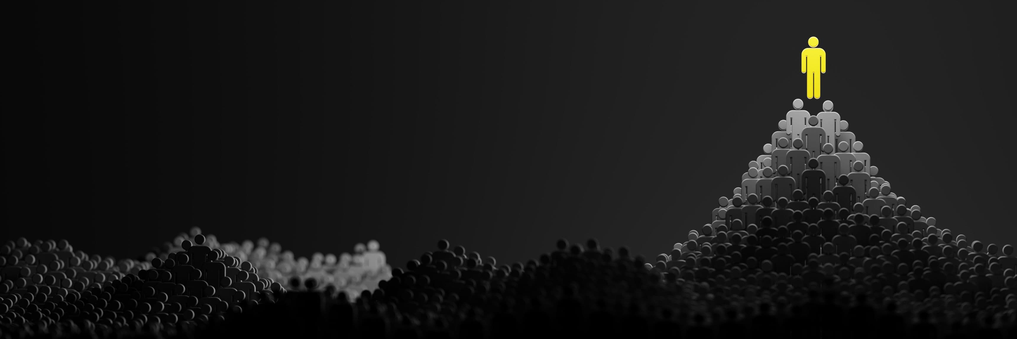 A bright yellow human figure stands atop a dark, abstract, pixelated mountain peak.