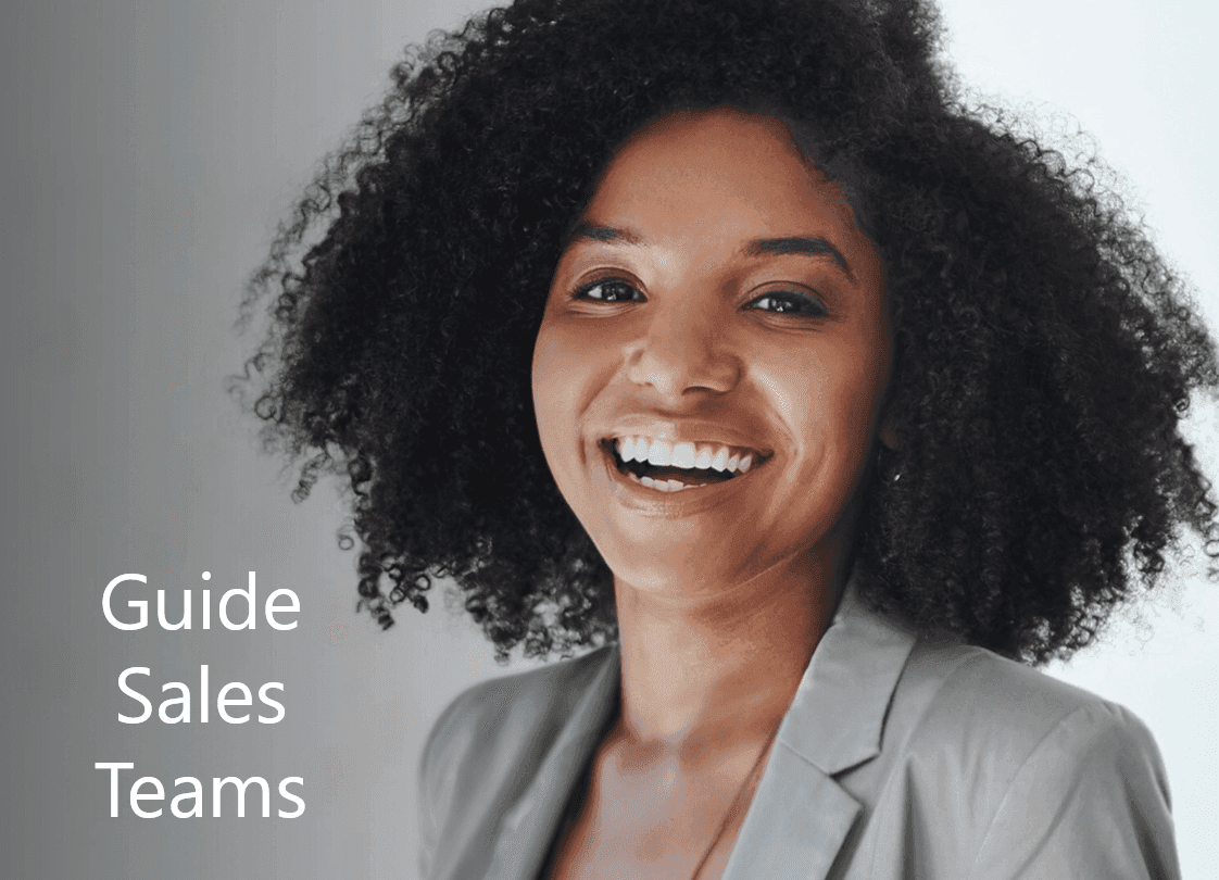 Smiling woman with dark curly hair and blazer; text reads 'Guide Sales Teams'.